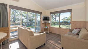 Cabin, 2 Bedrooms, Partial Ocean View (Mariner) | Living room | Flat-screen TV, DVD player - Holiday Haven White Sands (Huskisson)