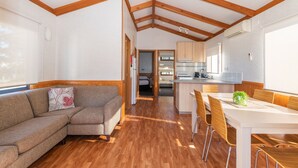 Cabin, 2 Bedrooms, Partial Ocean View (Callala Bay) | Living area | Flat-screen TV, DVD player - Holiday Haven White Sands (Huskisson)
