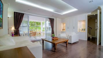 3-Bedroom House | Living room | Flat-screen TV, DVD player