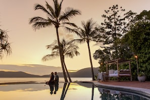 Outdoor pool, open 7 AM to 9 PM, free pool cabanas, pool umbrellas