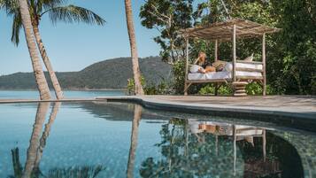 Outdoor pool, open 7 AM to 9 PM, free pool cabanas, pool umbrellas