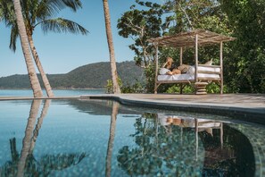 Outdoor pool, open 7 AM to 9 PM, free cabanas, pool umbrellas