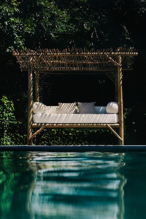Outdoor pool, open 7 AM to 9 PM, free cabanas, pool umbrellas