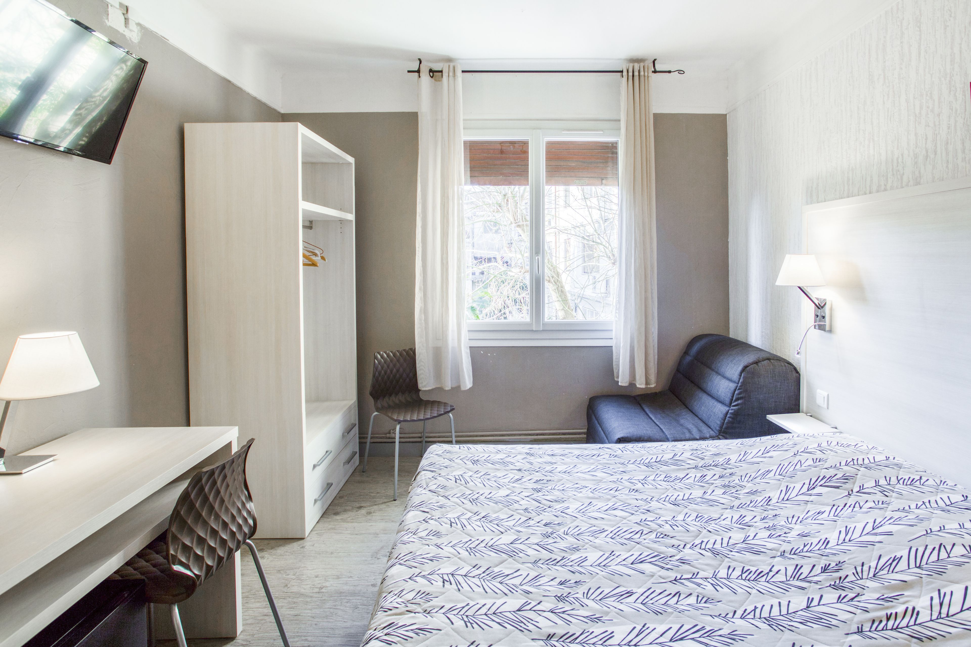 family room | individually decorated, individually furnished, desk, blackout curtains