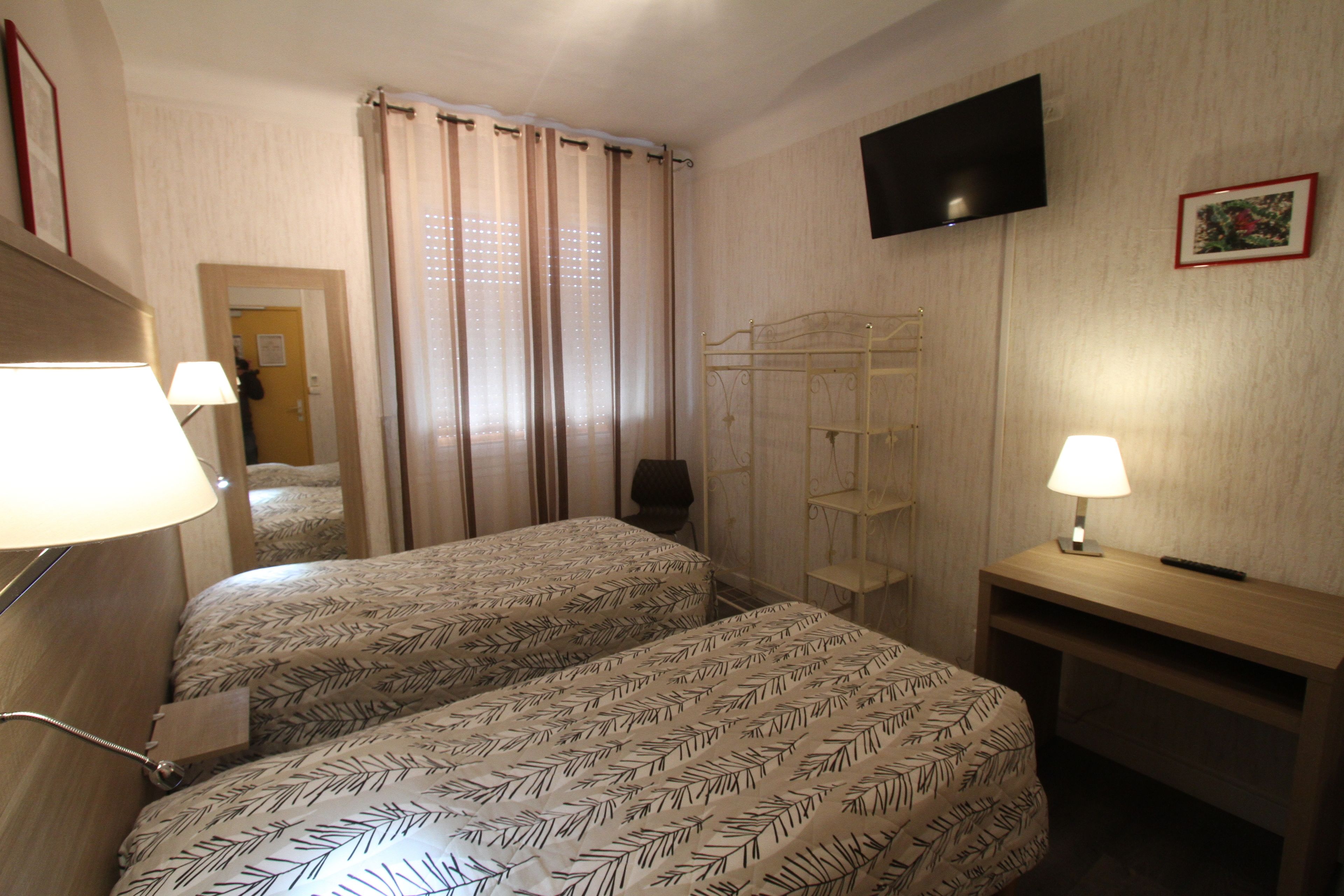 twin room | individually decorated, individually furnished, desk, blackout curtains