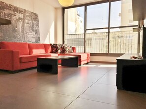 Luxury Townhome, 2 Bedrooms, Beachside | Living room | Flat-screen TV - Hilton Beach Stunning Designer 2BR APT (Tel Aviv)