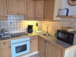 Fridge, microwave, oven, highchair
