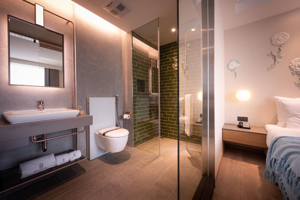 king room | bathroom | hair dryer, bathrobes, slippers, towels