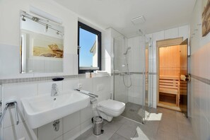 Shower, hair dryer, bathrobes, soap