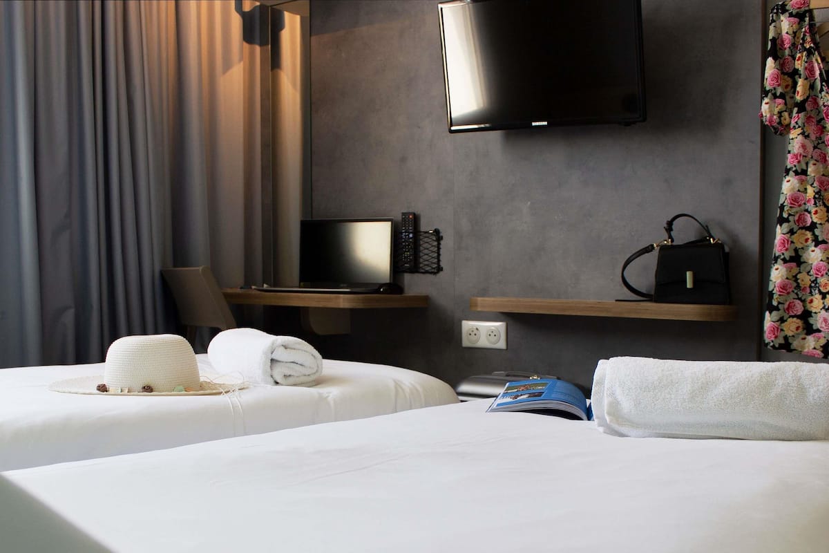 Standard Twin Room, 2 Twin Beds | Individually furnished, free WiFi, bed sheets
