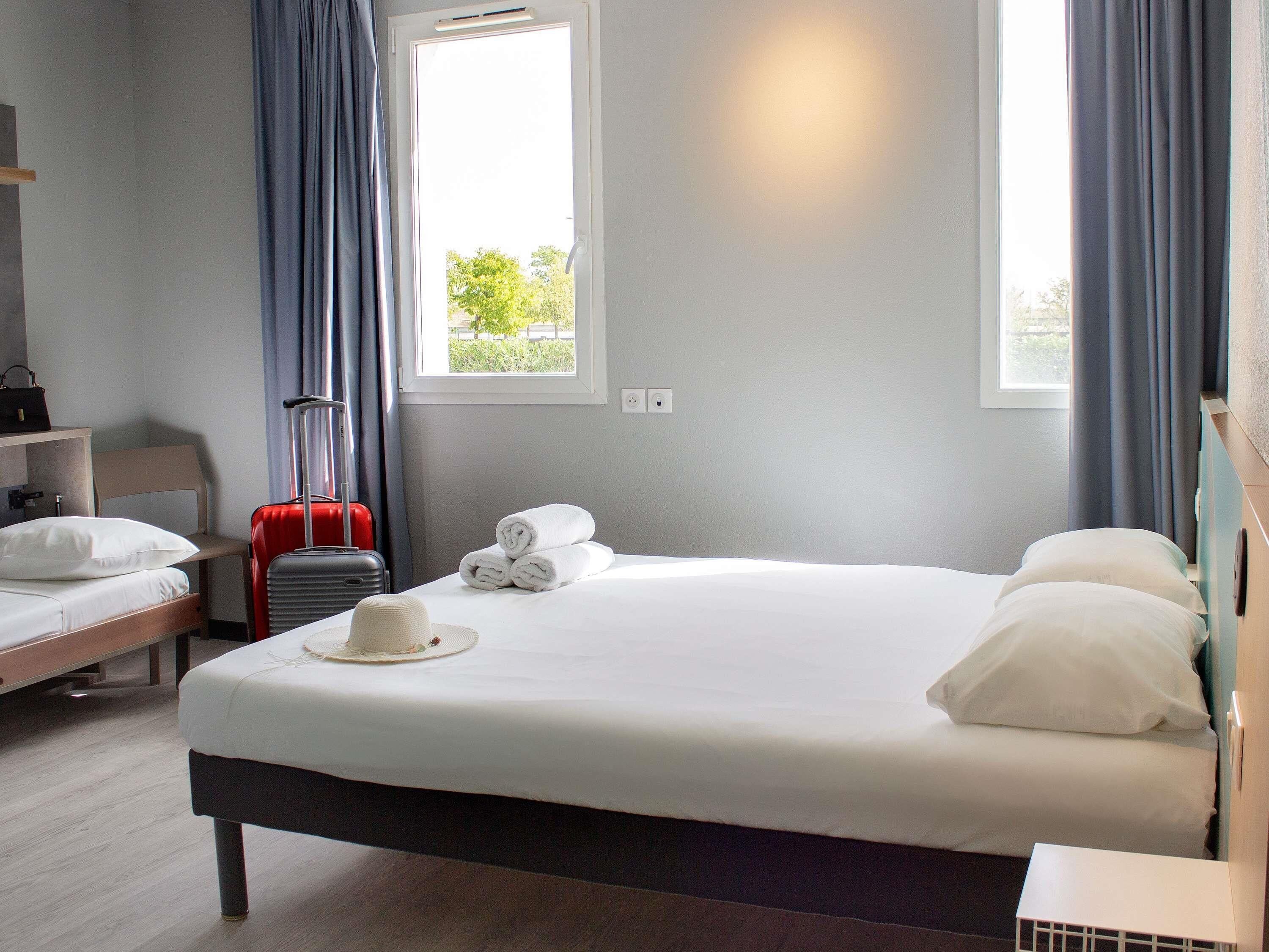 Standard Double Room, Multiple Beds | Individually furnished, free WiFi, bed sheets