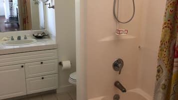 Combined shower/bathtub, hair dryer, towels, soap