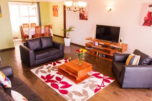 50-inch Smart TV with cable channels, TV - Huku Qwetu C5 City Breeze Apartment (Nairobi)