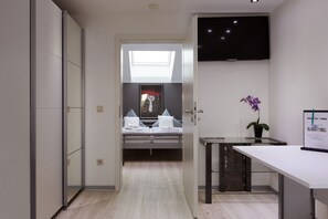 Family Room | Desk, soundproofing, iron/ironing board, free WiFi - Hotel Rühen 24-hour check-in, free parking, guest kitchen (Rühen)