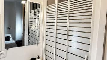 Shower, free toiletries, hair dryer, towels