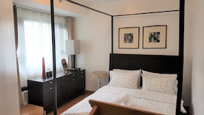 Appart'hôtel, 2 chambres | 2 chambres, coffres-forts dans les chambres, fer et planche à repasser