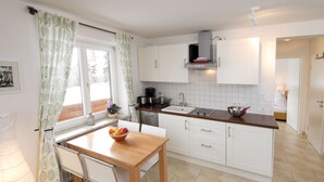 House (2) | Private kitchenette | Coffee/tea maker, full-sized fridge, microwave, stovetop - Haus Luna Apartments (Schwangau)
