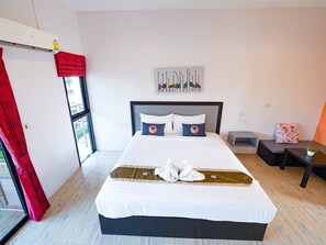 Standard Double Room, 1 Queen Bed | Laptop workspace, blackout drapes, bed sheets - RoomQuest Chonburi Phanat Nikhom (Phanat Nikhom)