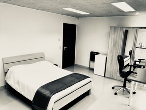 Premium bedding, desk, rollaway beds, free wired Internet