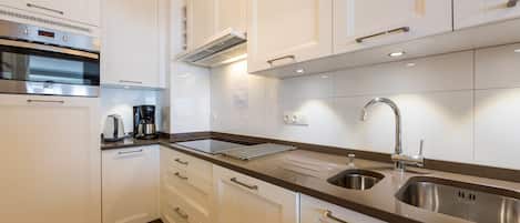 Apartment, 2 Bedrooms | Private kitchen | Fridge, microwave, oven, dishwasher