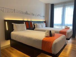 Standard Triple Room | Blackout drapes, soundproofing, iron/ironing board, bed sheets