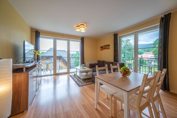 Comfort Apartment, 1 Bedroom, City View | Living room | Flat-screen TV