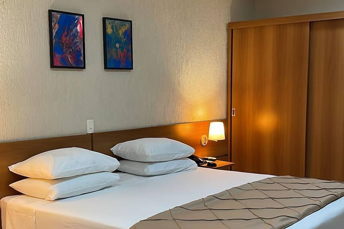 Standard Room, Pets Allowed | Minibar, in-room safe, laptop workspace, blackout drapes