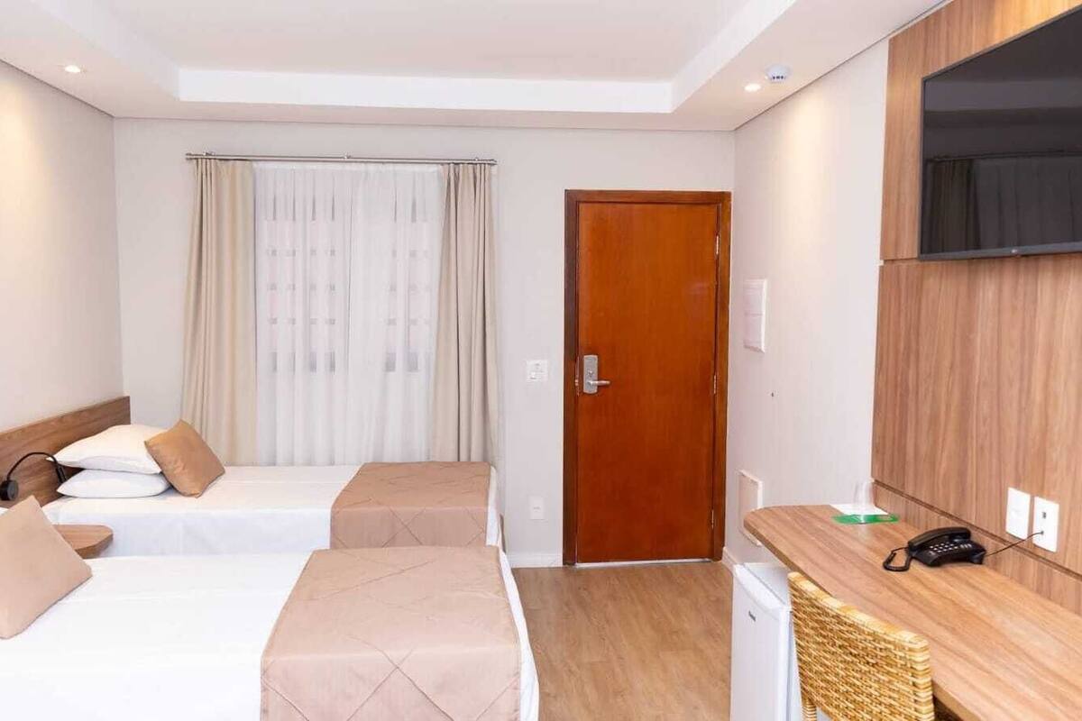 Premium Room, Pets Not Allowed | Minibar, in-room safe, laptop workspace, blackout drapes
