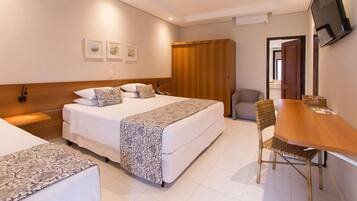 Deluxe Room, Pets Allowed | Minibar, in-room safe, laptop workspace, blackout drapes
