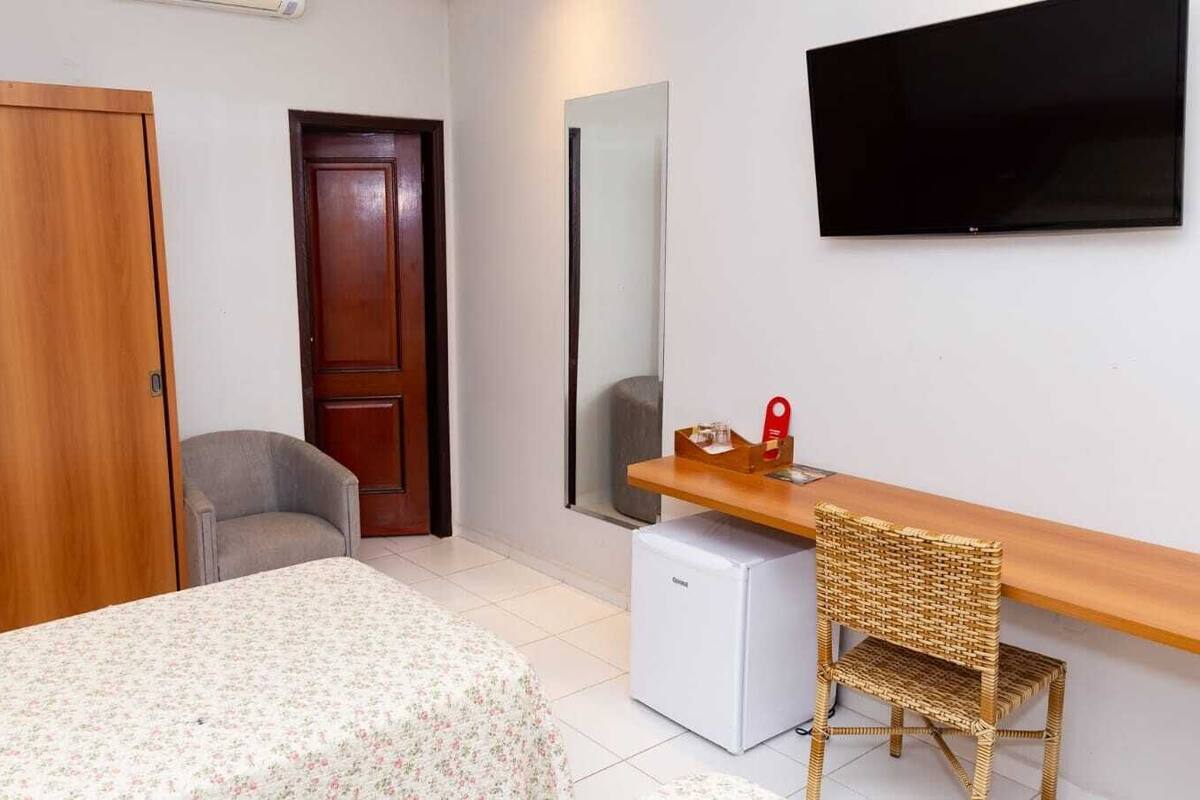 Deluxe Room, Pets Allowed | Minibar, in-room safe, laptop workspace, blackout drapes