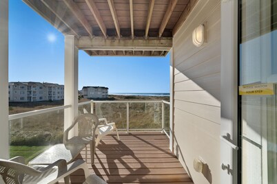 Waterfront condo with ocean views, pool, hot tub, gym & W/D - dog-friendly
