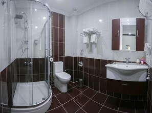 Shower, free toiletries, hair dryer, towels