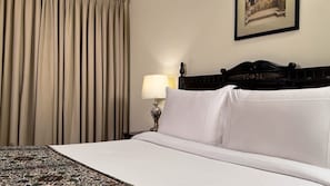 Suite | Ropa de cama de alta calidad, minibar, caja fuerte y escritorio