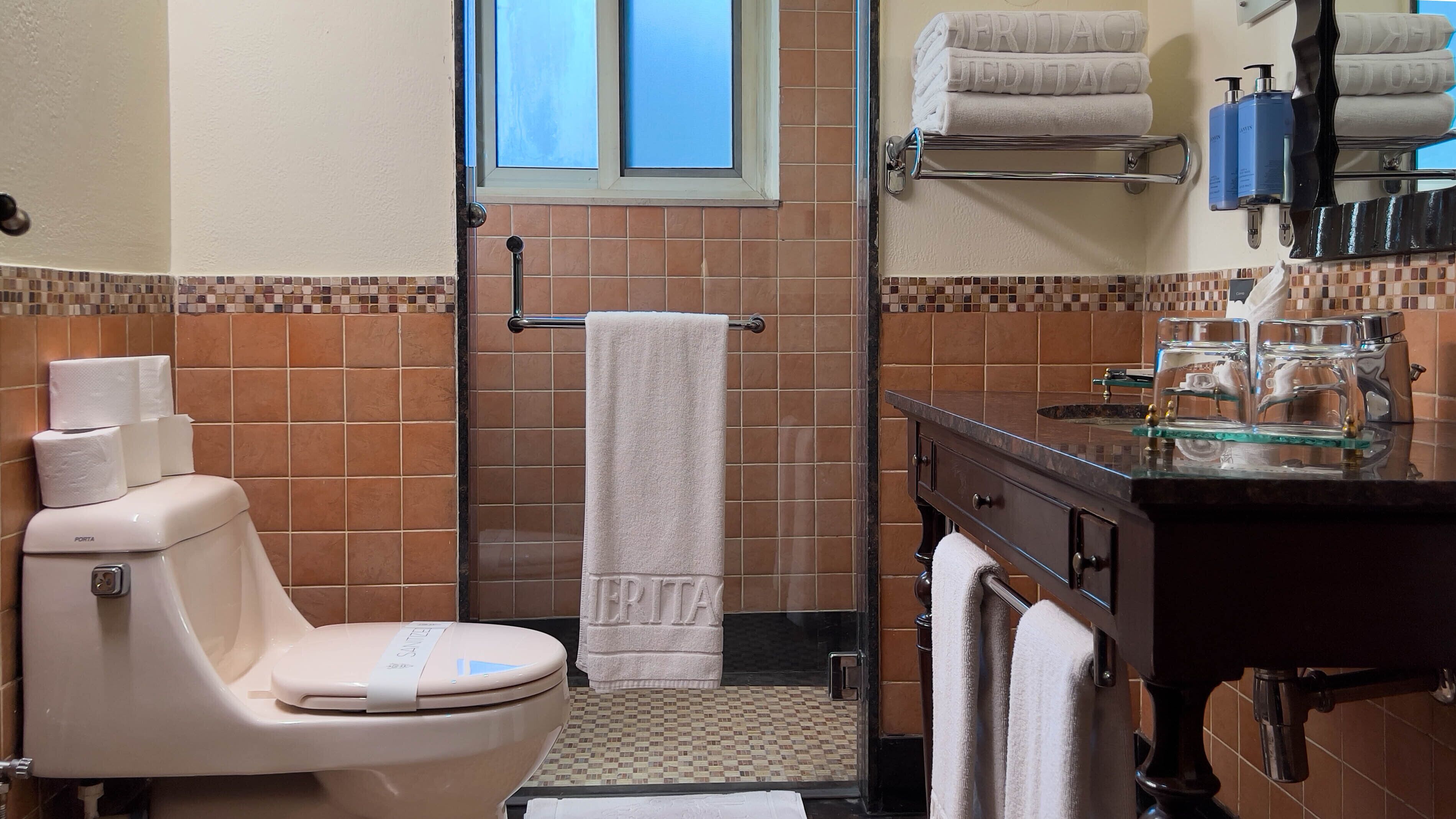 one bed suite | bathroom | shower, hair dryer, bathrobes, slippers