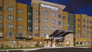 A multi-story hotel with a modern design, featuring a prominent sign for the Residence Inn by Marriott. - Residence Inn by Marriott Louisville East/Oxmoor (Louisville)