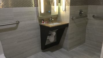 Room, 1 King Bed, Accessible, Non Smoking (Mobility/Hearing Roll-in Shower) | Bathroom | Bathtub, hair dryer, towels