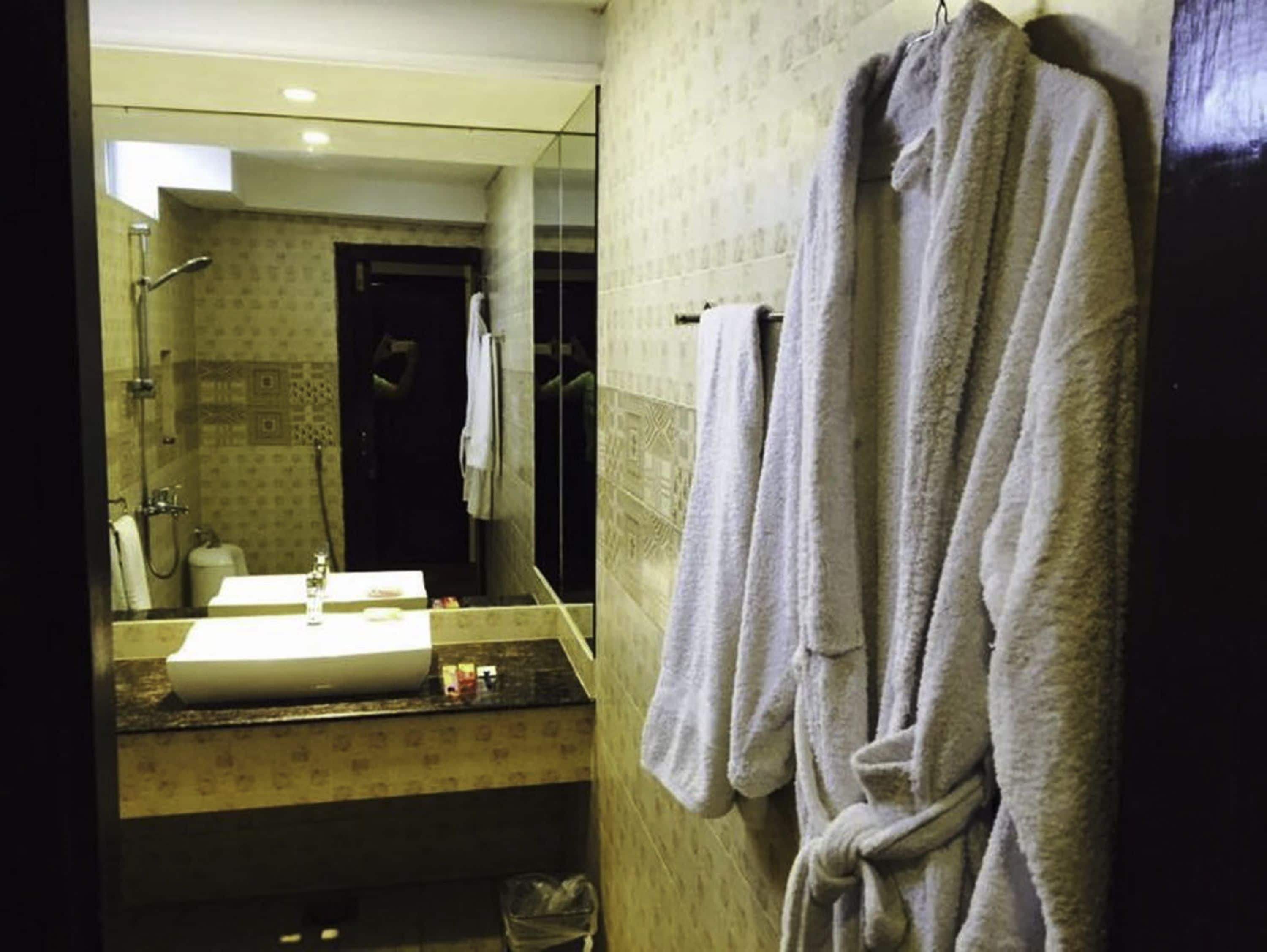 shower, free toiletries, slippers, towels