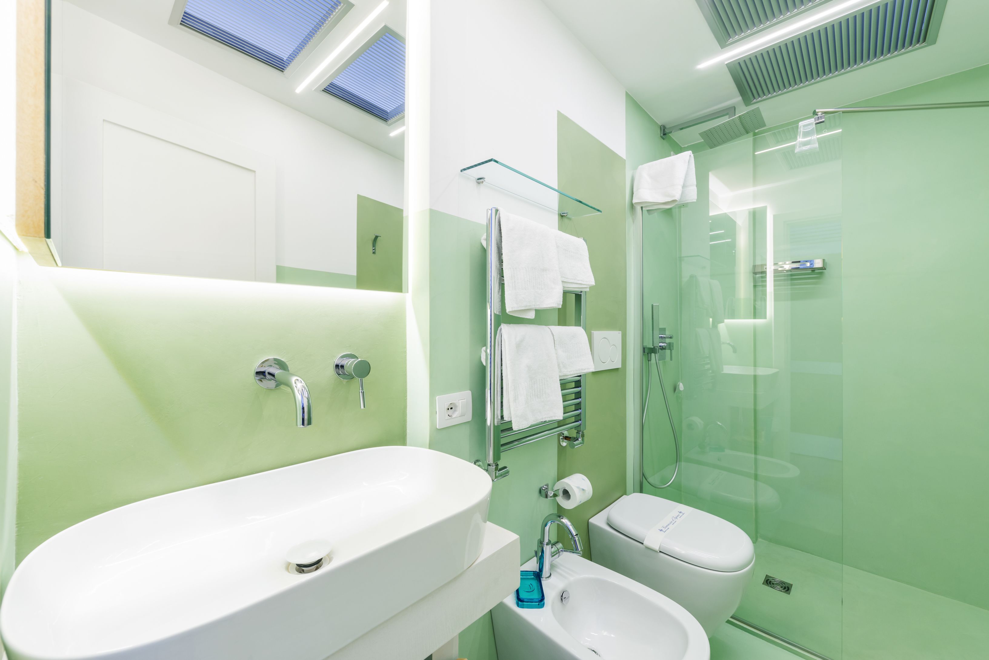 separate bathtub and shower, jetted bath, rainfall showerhead