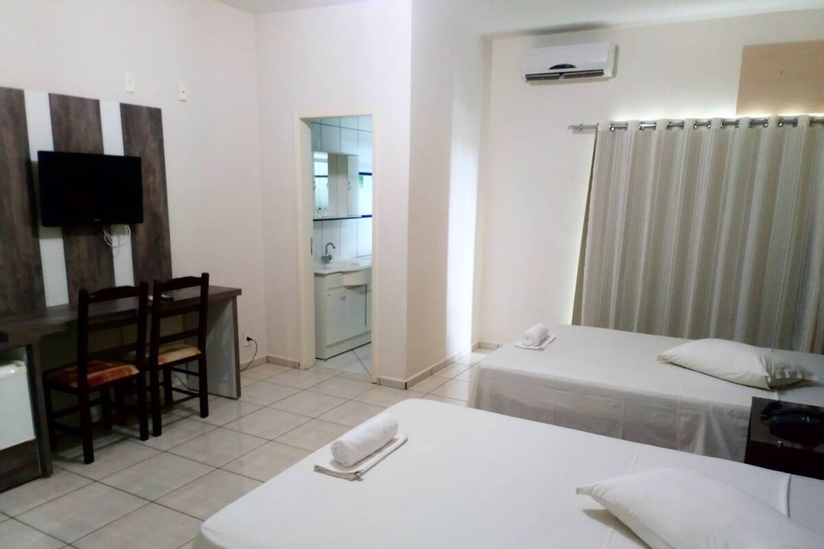 Minibar, desk, blackout curtains, iron/ironing board