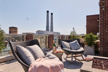 Penthouse, 1 King Bed with Sofa bed | Pillowtop beds, minibar, in-room safe, desk at The Alida, Savannah, a Tribute Portfolio Hotel