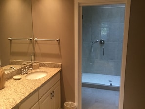 Combined shower/tub, hair dryer, towels, soap