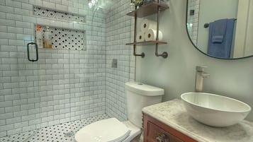 Combined shower/tub, hair dryer, towels, soap