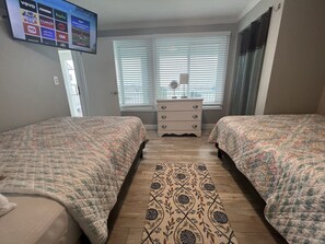 3 bedrooms, desk, iron/ironing board, travel cot