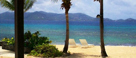 On the beach, sun-loungers, beach towels