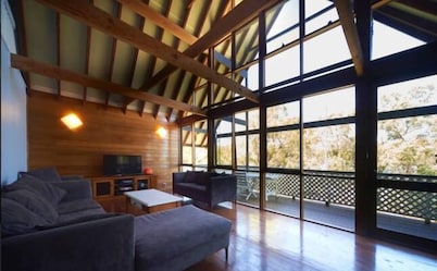 An island style escape - Stunning oak A-frame Waterfront home  Access by water