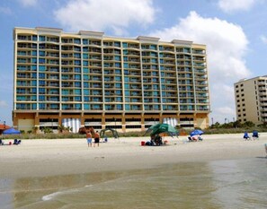 On the beach, sun-loungers, beach towels