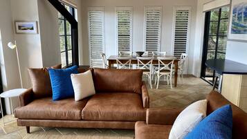 Flat-screen TV, fireplace, DVD player, stereo