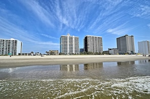 On the beach, sun loungers, beach umbrellas, beach towels