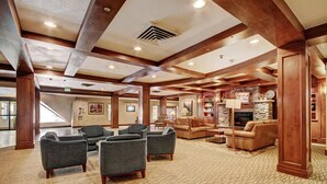 A spacious lobby with a conference center, seating area, and a fireplace. - Gorgeous Ski Mountain Views 2 Bedroom, 2 Bath - Ski In Out Condo at Beaver Run (Breckenridge)