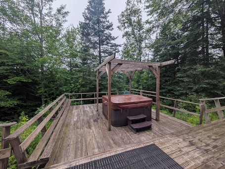 Terrace/patio. Cozy, comfy, rustic ski chalet at the foot of Ski Brule ski mountain